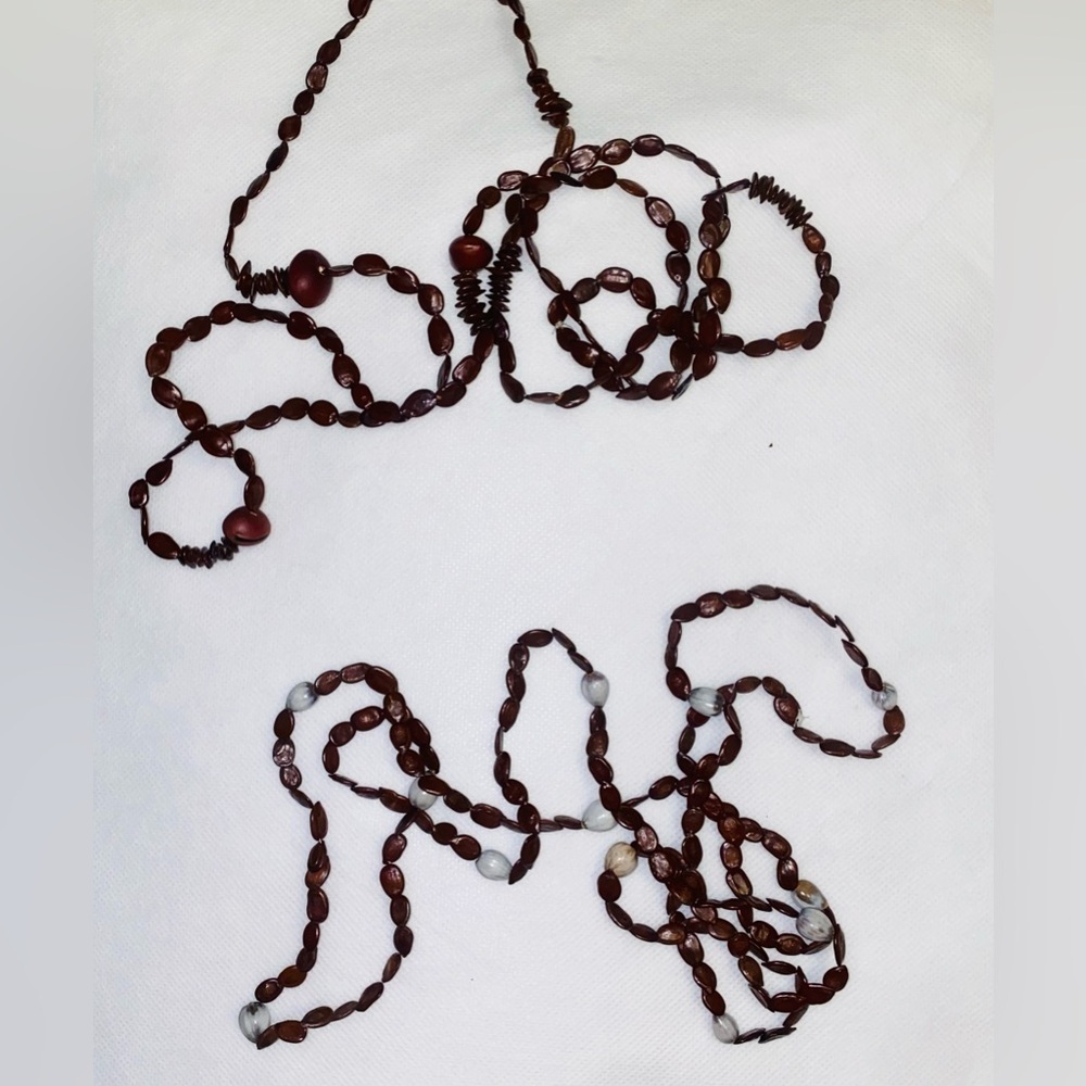 2 necklaces made of wood